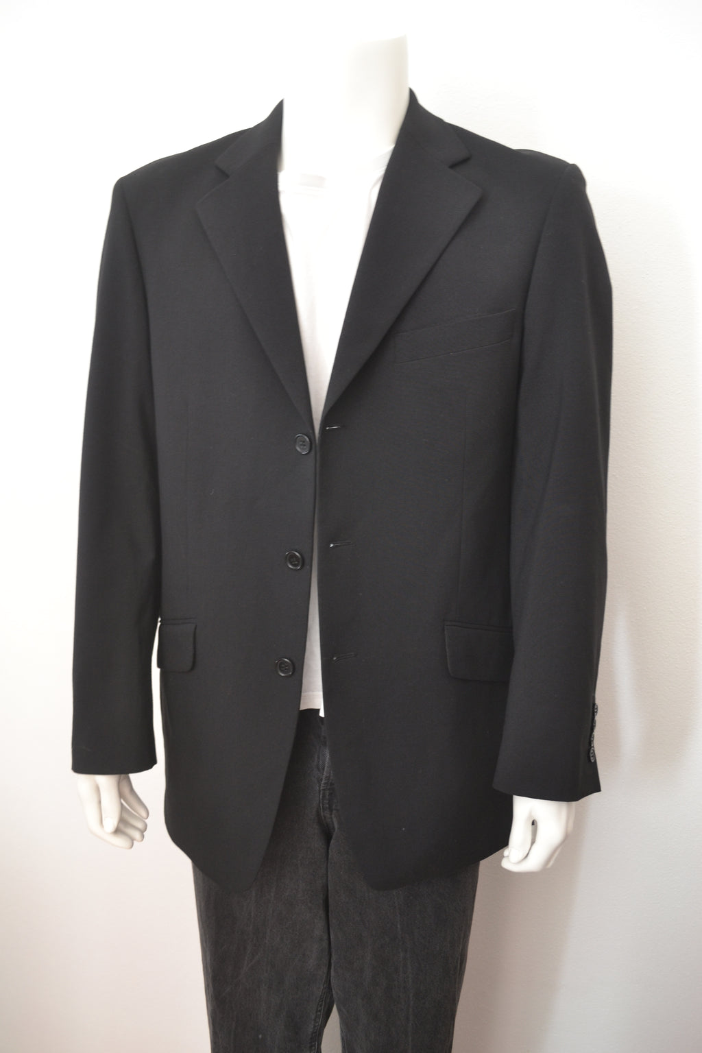 Sort blazer bagfra vinkel med patches