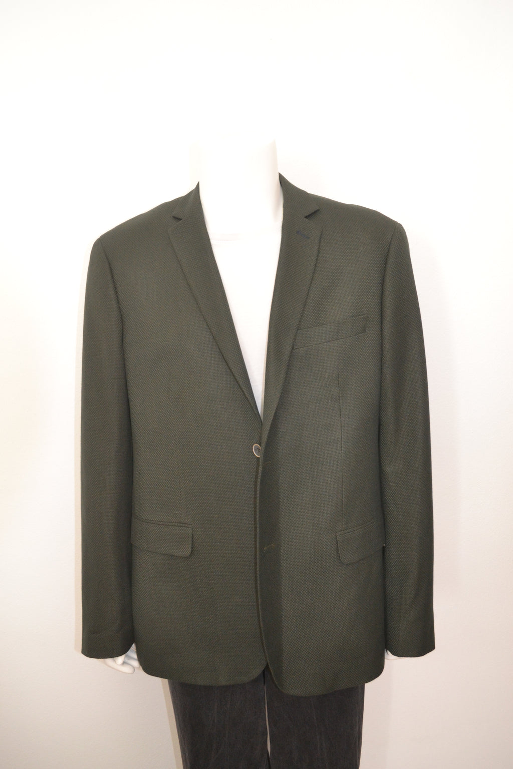 Mørkegrøn blazer forfra