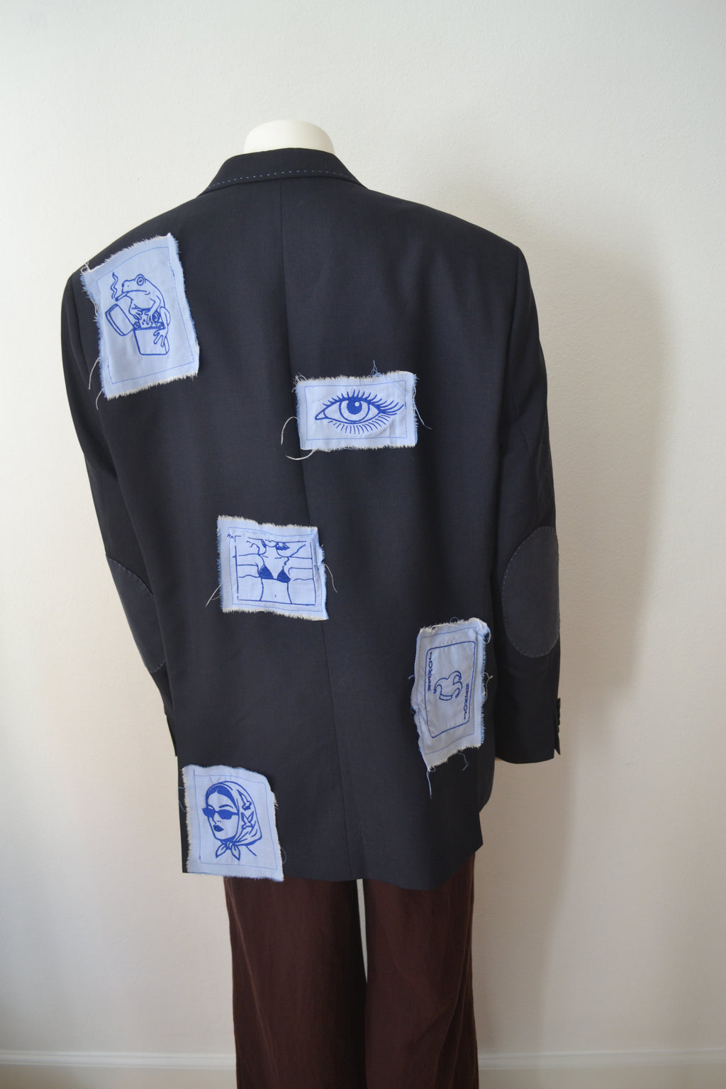 Sort blazer bagfra fuld med patches