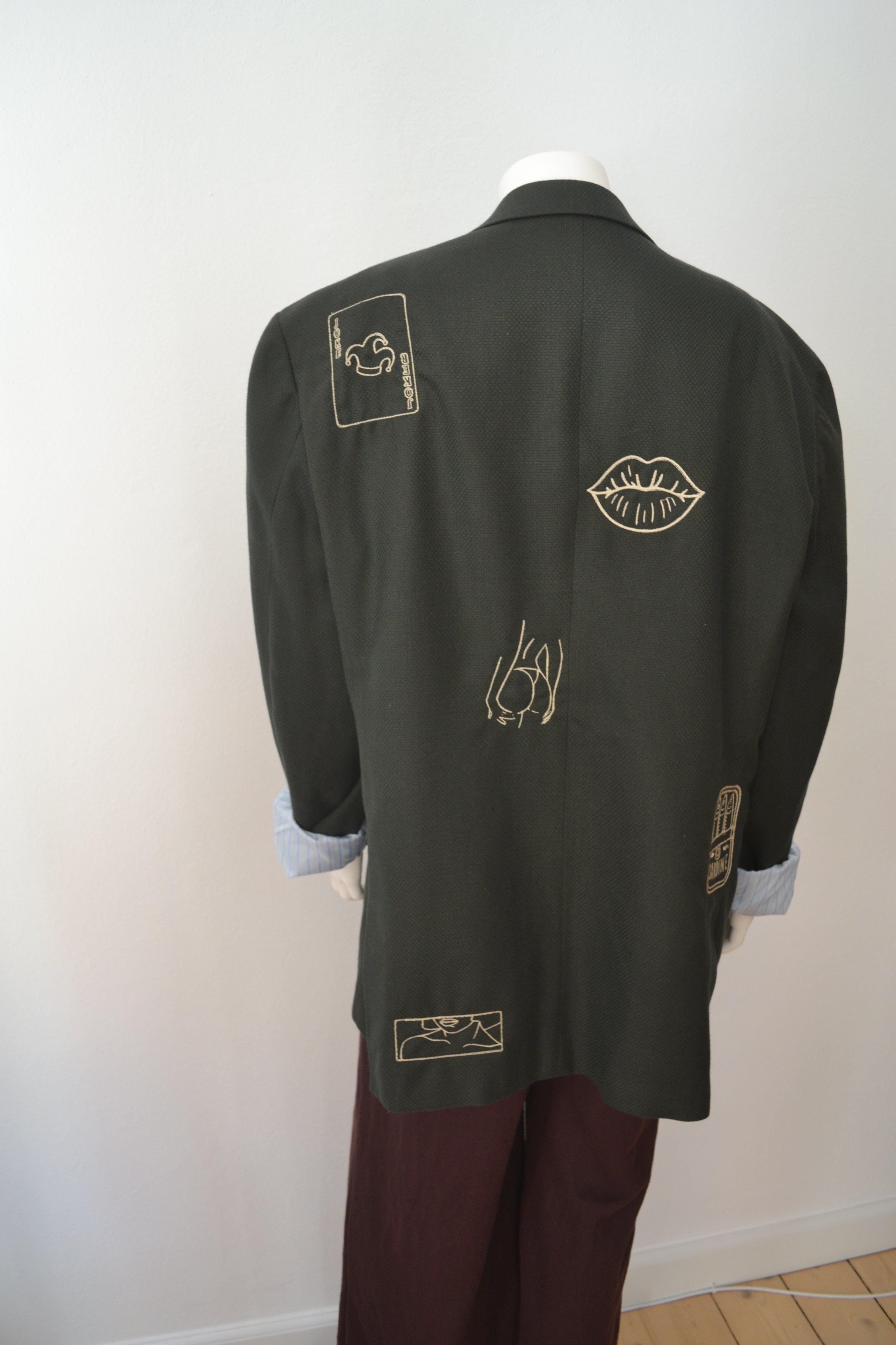 Mørkegrøn blazer bagfra vinkel
